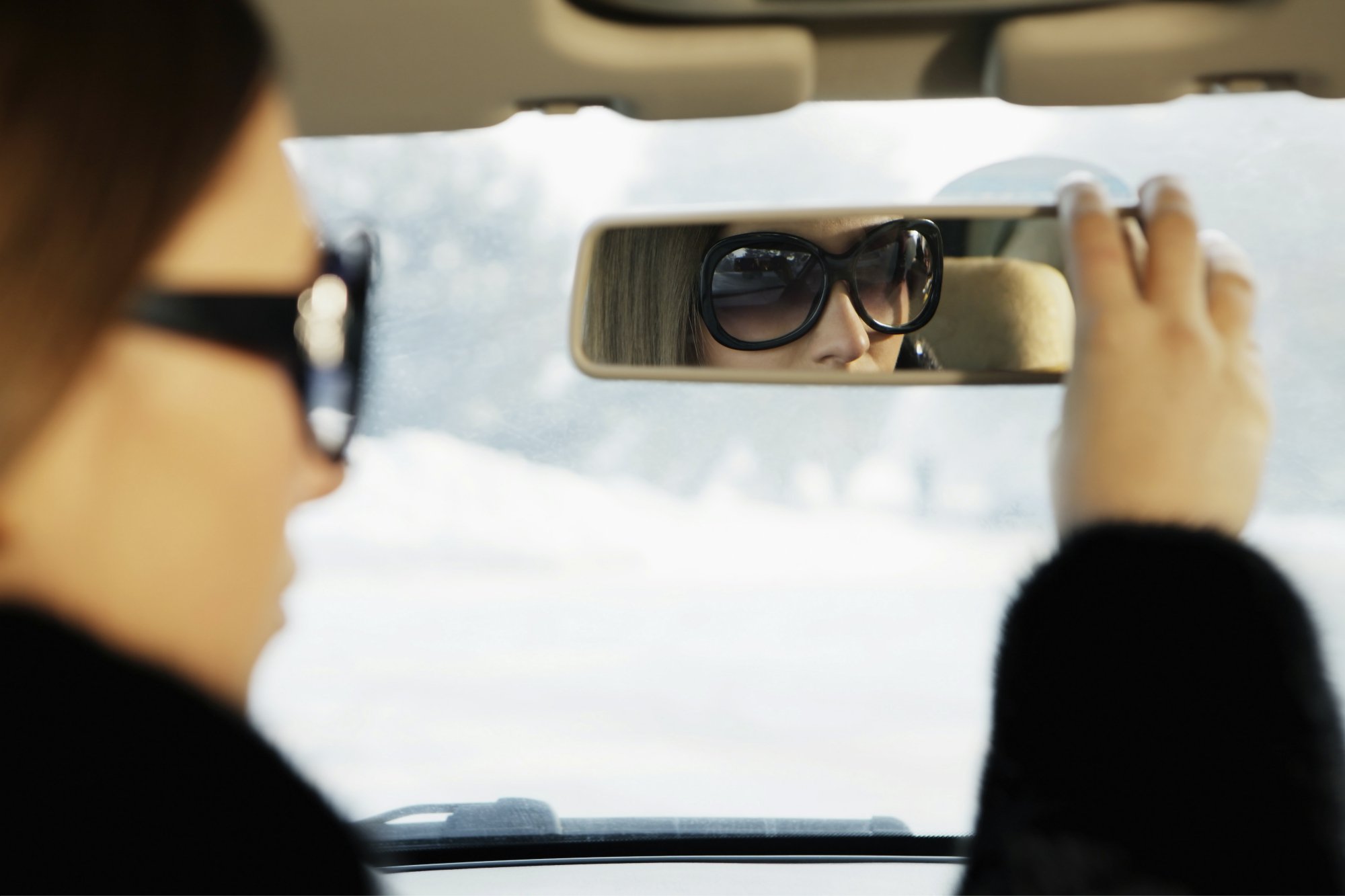 woman driving in snow