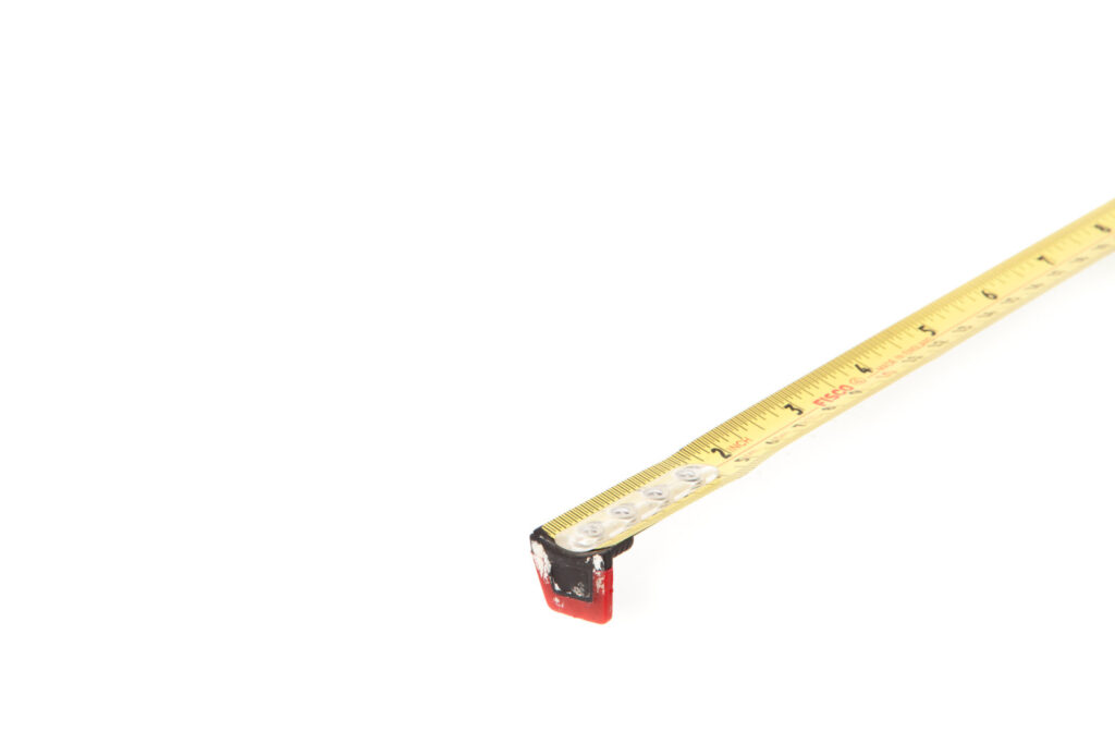 measuring tape to check snowblower tire chain clearance